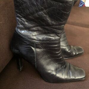 Womens Skechers Brand high heel boots.